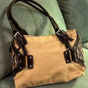 Canvas tan and leopard handbag.